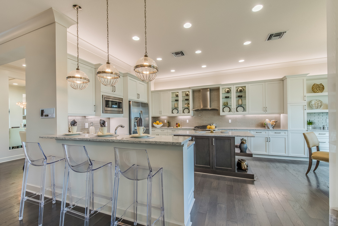 Luxury kitchen with double island and beautiful pendant lights